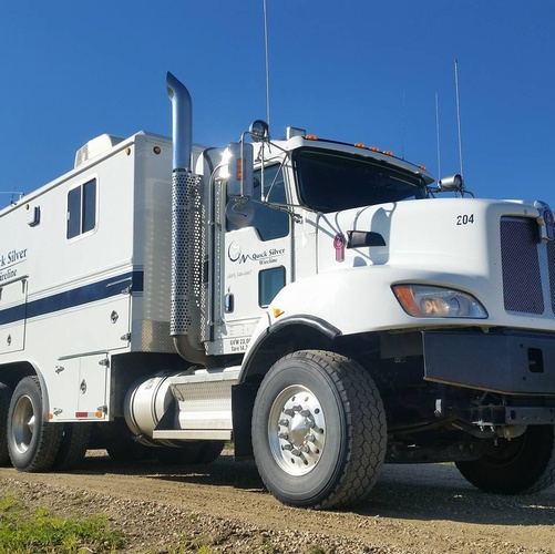 Quick Silver Wireline Vehicle on Road - Wireline Company in Drayton Valley